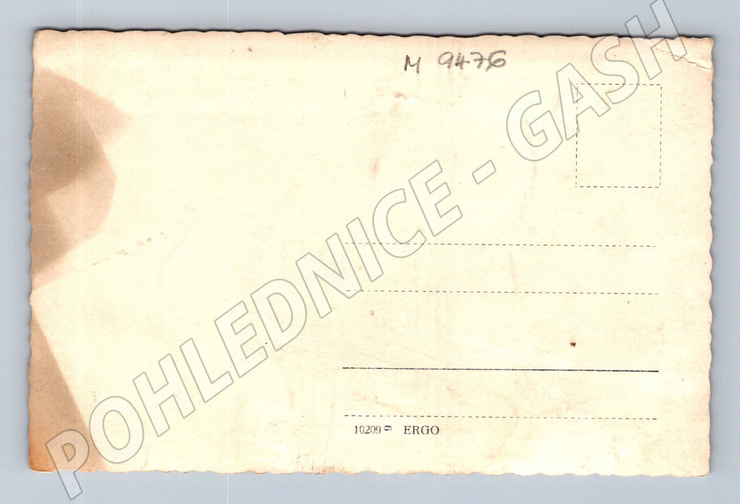 Postcard of a nun at a historic building (M9476)