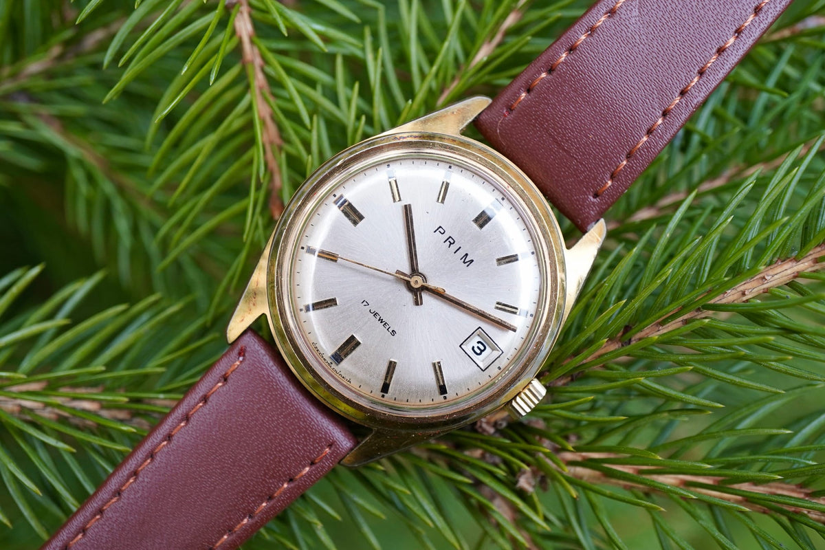 Hodinky PRIM 17 JEWELS datumovka zlaté pouzdro hnědý řemínek (SE121)