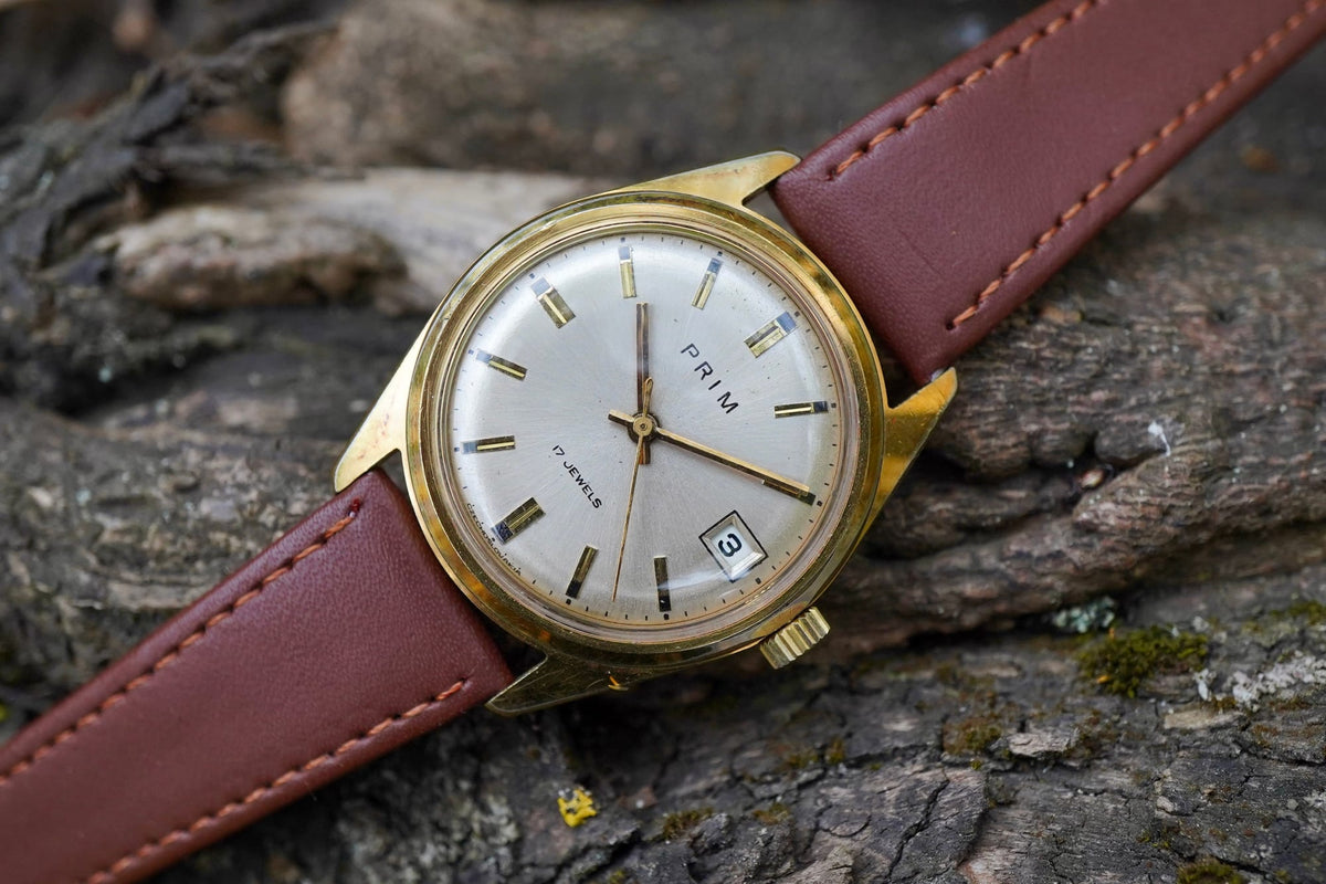 Hodinky PRIM 17 JEWELS datumovka zlaté pouzdro hnědý řemínek (SE121)