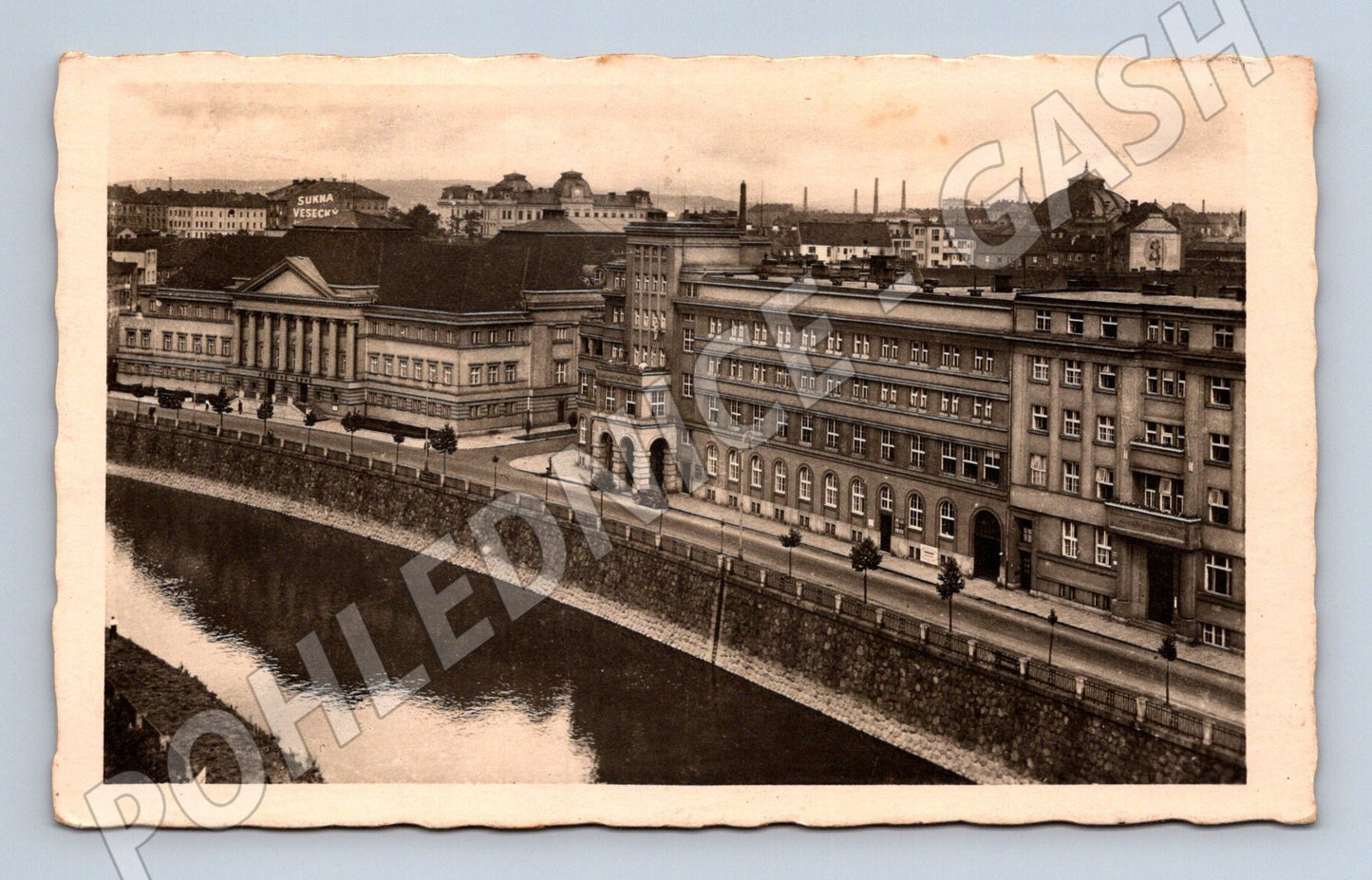 Pohlednice Plzeň řeka a budovy SUKNA VESECKY 1943 (BM25604)