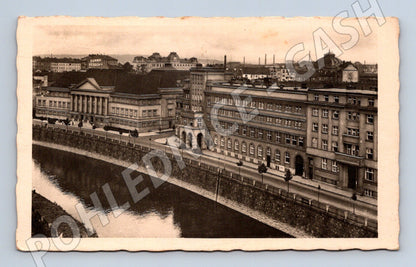 Pohlednice Plzeň řeka a budovy SUKNA VESECKY 1943 (BM25604)