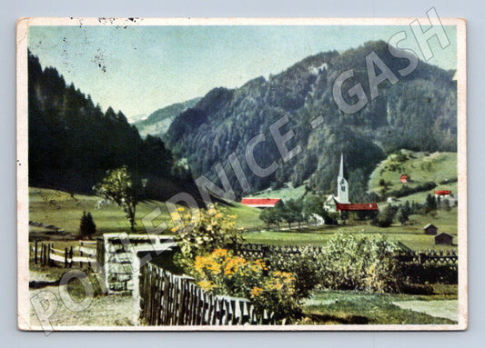 Pohlednice Rakousko alpská vesnice s kostelem odeslaná 1942 (M16408)