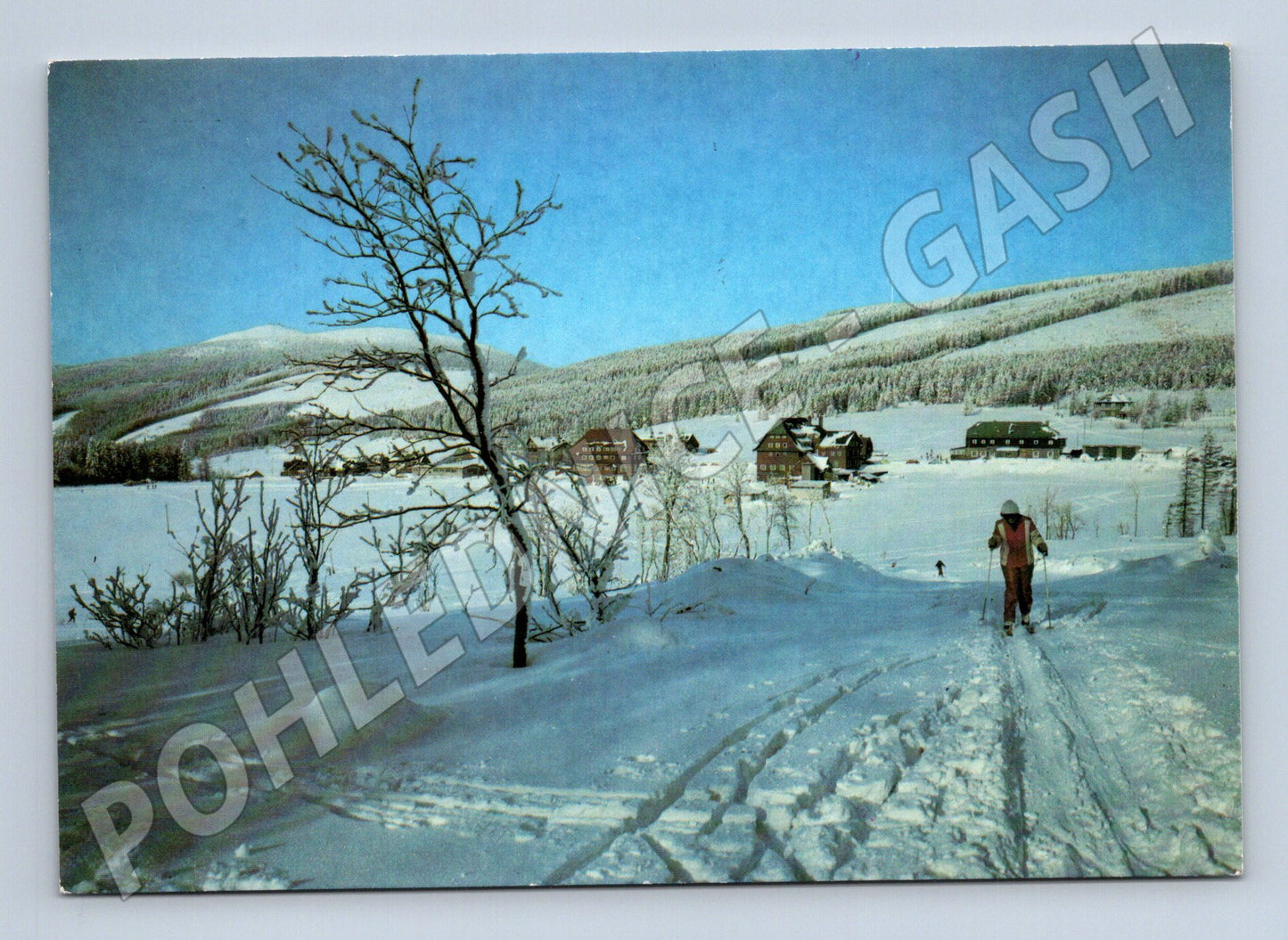 Pohlednice zimní horská krajina se sjezdařem 1985 (M24072)