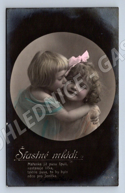 Happy young children in an embrace old postcard (M2459)