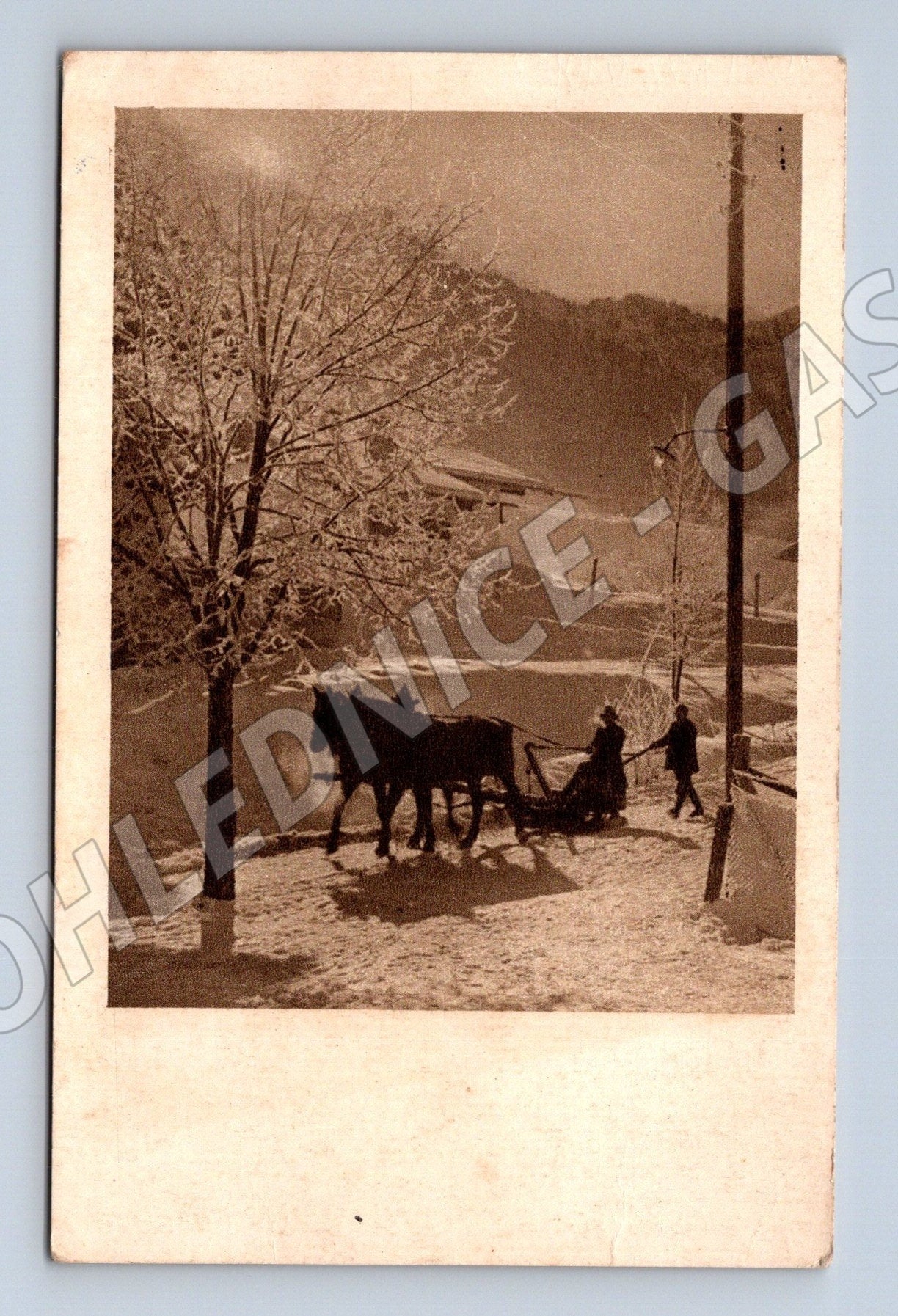 Pohlednice zimní krajina, muž s koněm a pluhem (M26162)