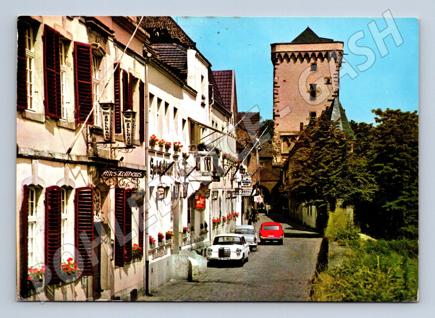 Pohlednice Německo Dormagen-Zons ulice s věží 1982 (M31753)