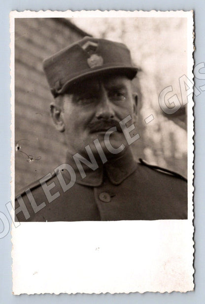 Postcard portrait of a soldier in black and white uniform (M3187)