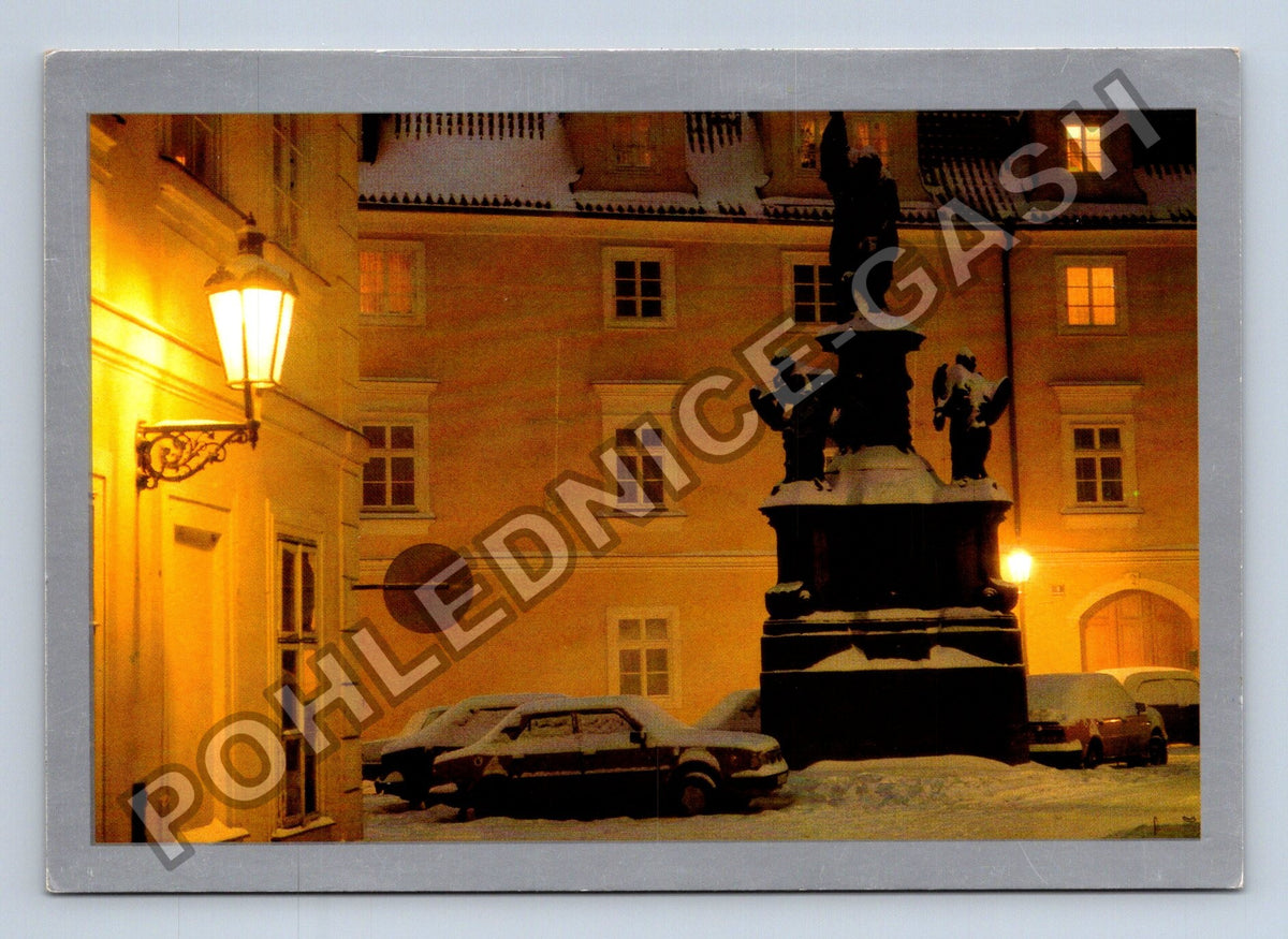 Pohlednice Praha zasněžené Staroměstské náměstí večer (M39821)