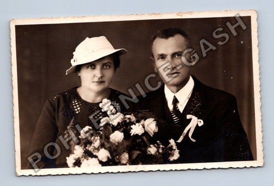 Pár s květinami ateliérová fotografie (M40622)