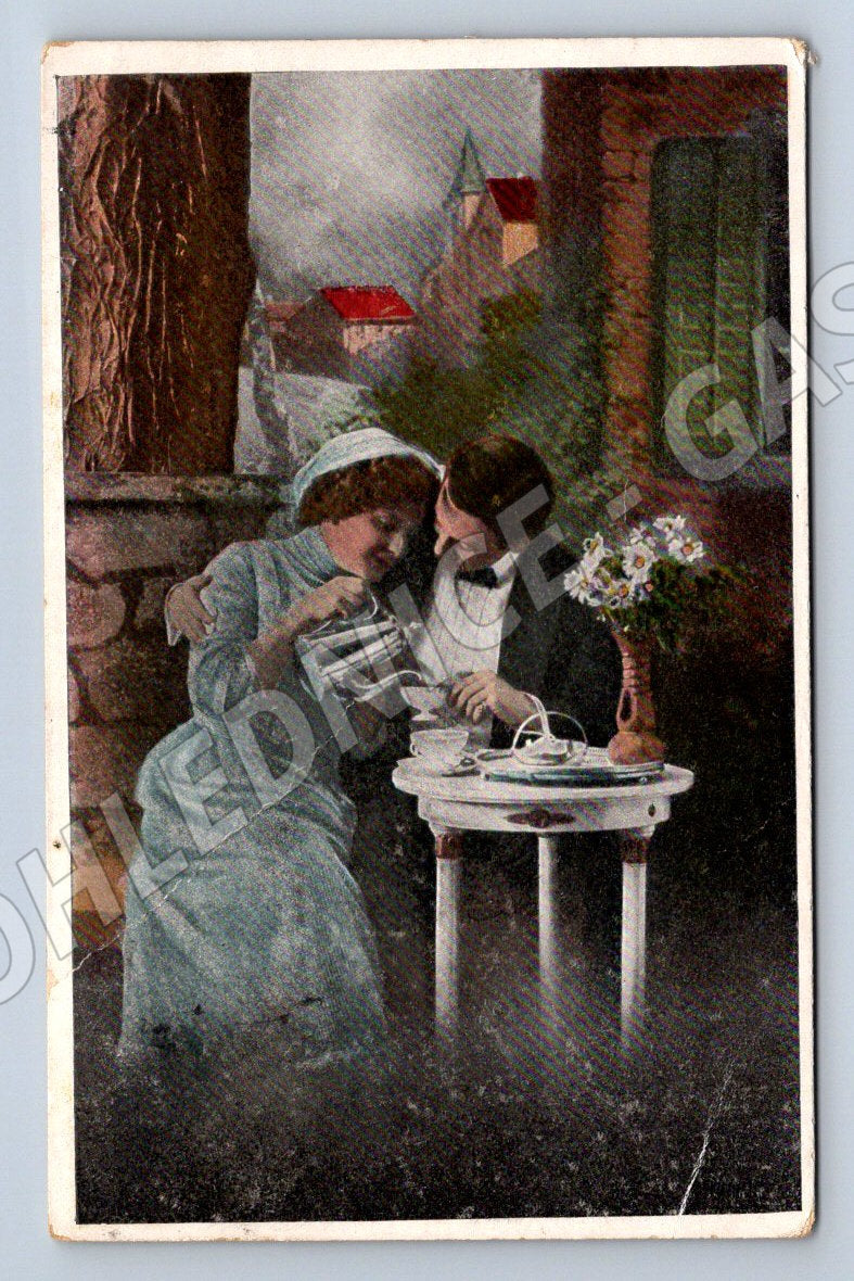 Postcard loving couple at the table ethnography (ST3426)